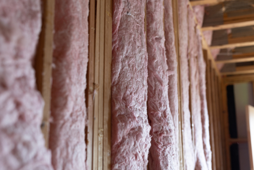 Fiberglass batt insulation installed in a new construction wall