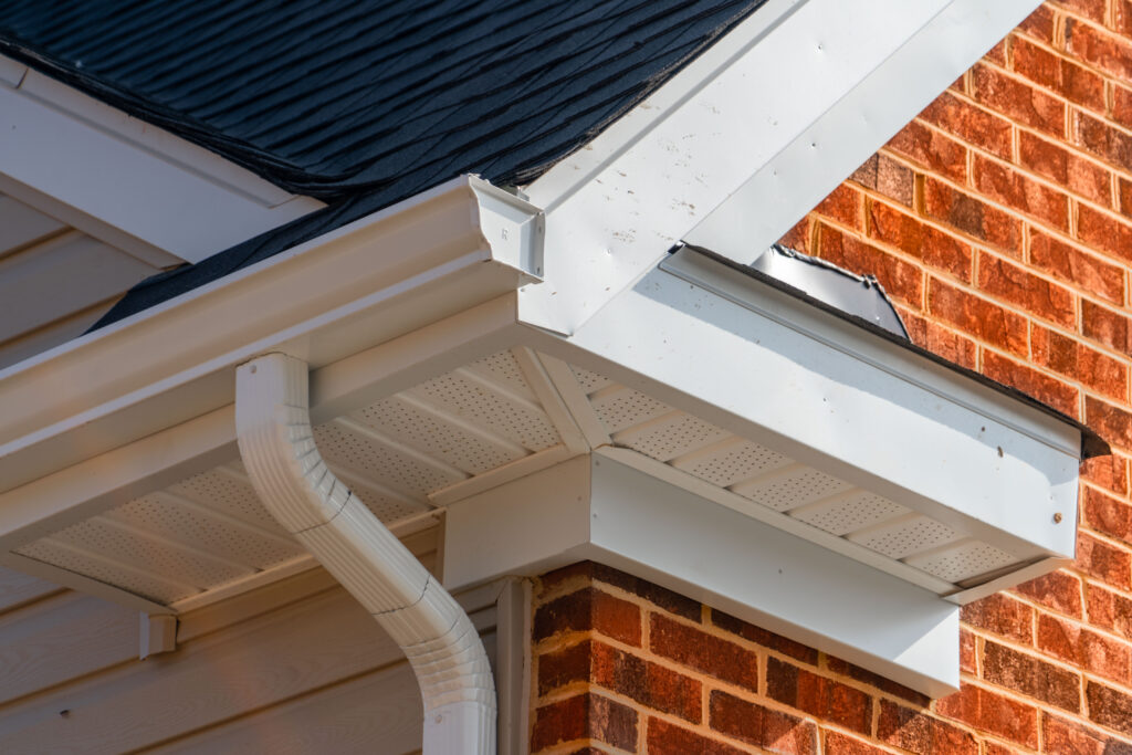 Gutters installed on a brick home